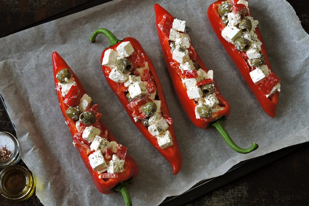 red sweet peppers stuffed with feta and olives, and capers.